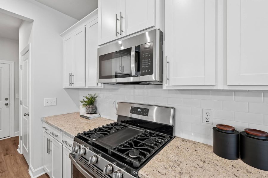 Representative furnished interior of a home built from the Eno by Tri Pointe Homes in Tredenham, Durham (Image 6).
