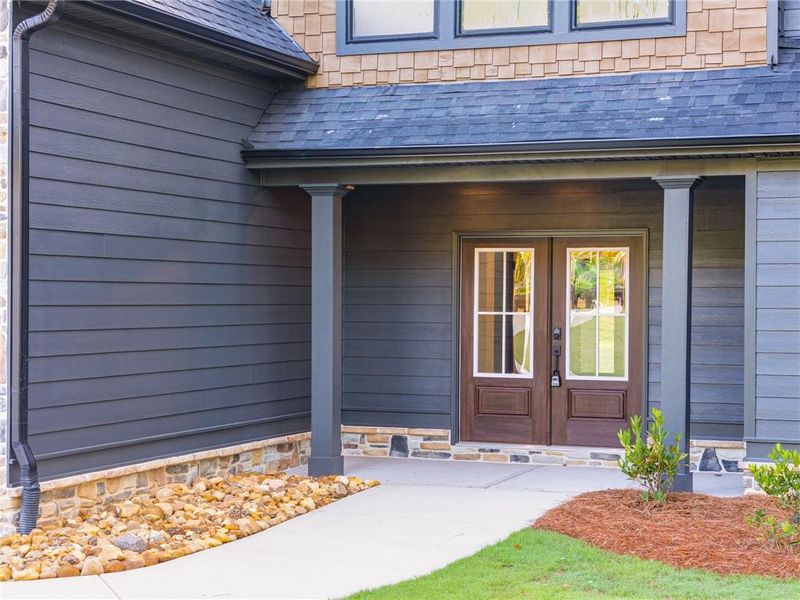 Front exterior of a new home in Liberty Station, Bremen, GA, highlighting curb appeal (Image 23).