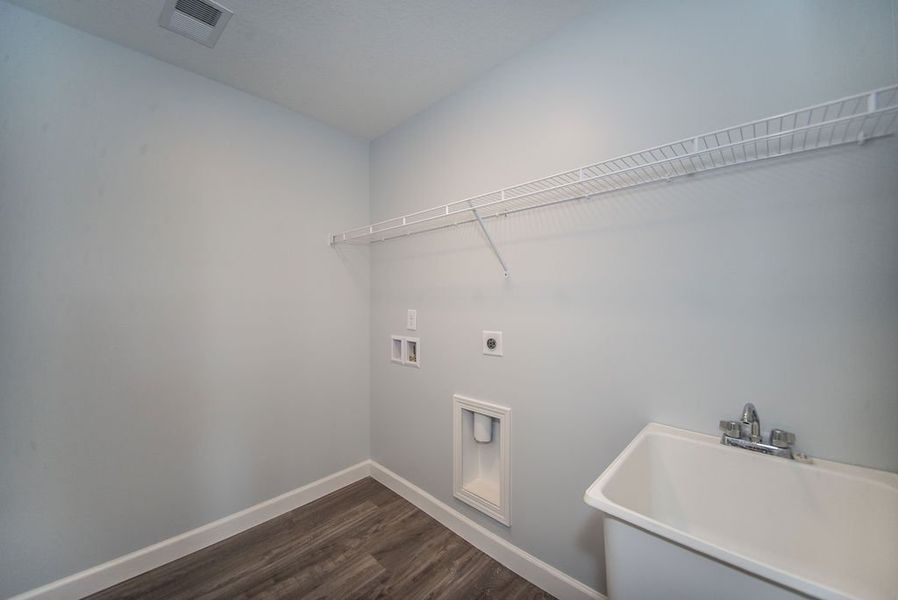 Representative unfurnished interior of a home built from the Franklin by Enchanted Homes in Guadalupe Heights, Seguin (Image 33).