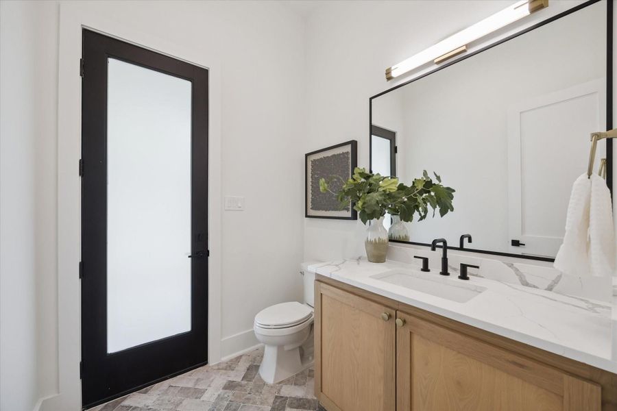 Bathroom off the MUD room and located for ease of access to yard and pool. Bathroom off the MUD room and located for ease of access to yard and pool.