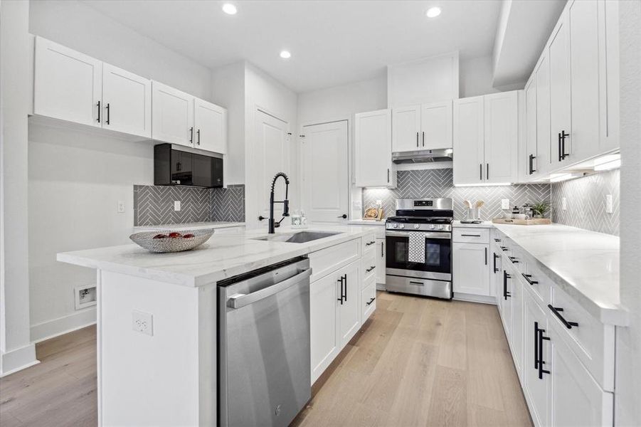 Spacious kitchen with large island allowing for additional stool seating