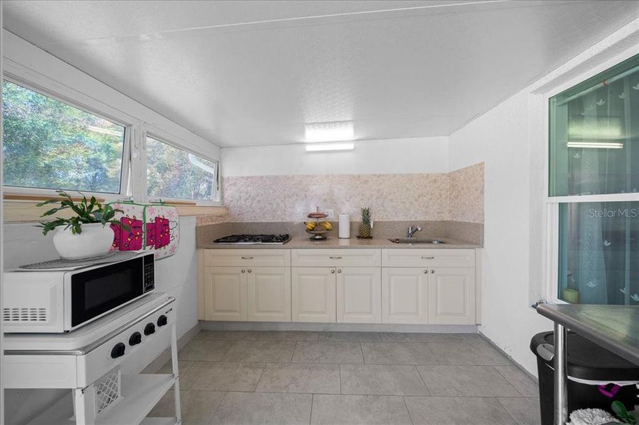 Furnished interior view inside a new home in , Dunnellon (Image 36).