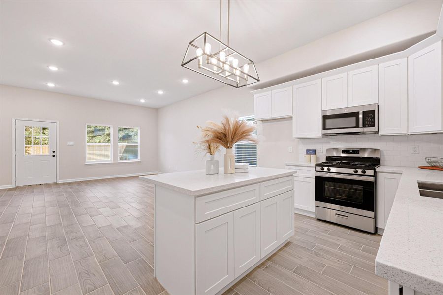 Awesome modern layout on the first floor puts the spacious living room open to the dining area and kitchen. From a previous project with a similar floor plan