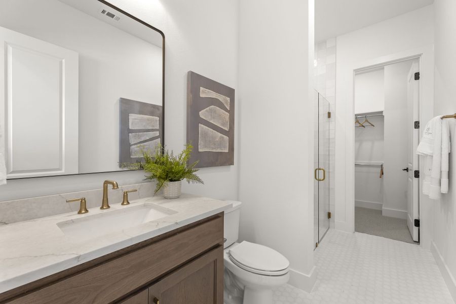 Representative furnished interior of a home built from the 6051 by Tradition Homes in StarView, Prosper (Image 10).