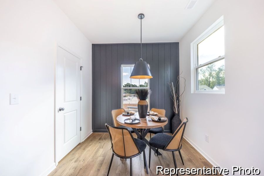 Furnished interior view inside a new home in Village at Reedy Creek Townhomes, Charlotte (Image 5).