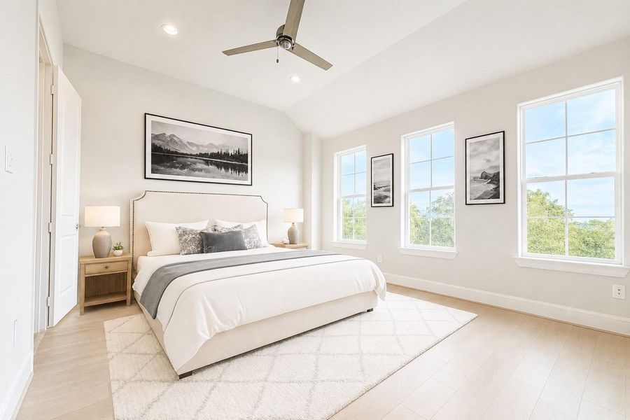 The large primary bedroom has high ceilings and large windows. Virtual staging added. The large primary bedroom has high ceilings and large windows. Virtual staging added.