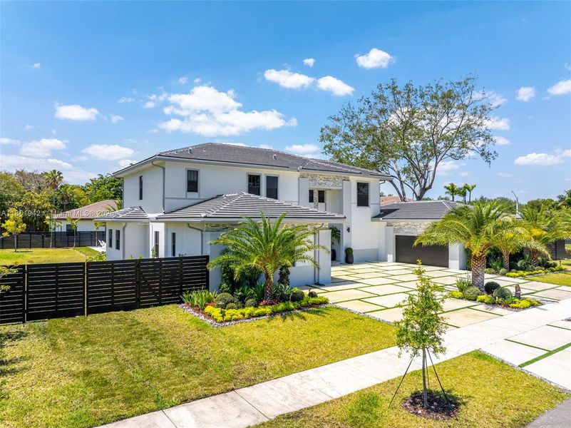 Front exterior of a new home in , Miami, FL, highlighting curb appeal (Image 20). Front exterior of a new home in , Miami, FL, highlighting curb appeal (Image 20).