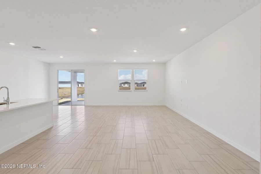 Spacious, unfurnished interior of a new home in Lakes at Bella Lago - Signature Series, Green Cove Springs (Image 28).