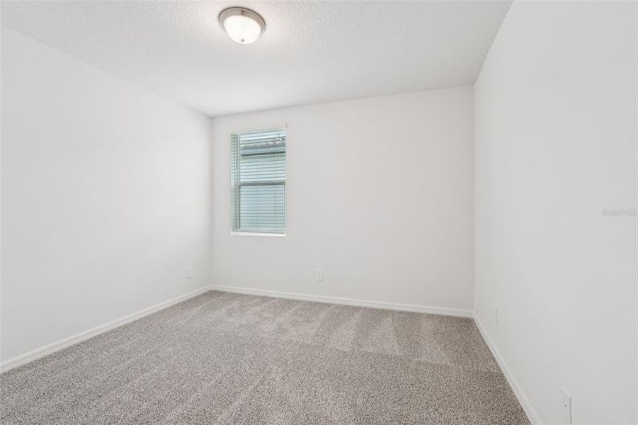 Spacious, unfurnished interior of a new home in Crosswinds - Signature Series, Haines City (Image 17).