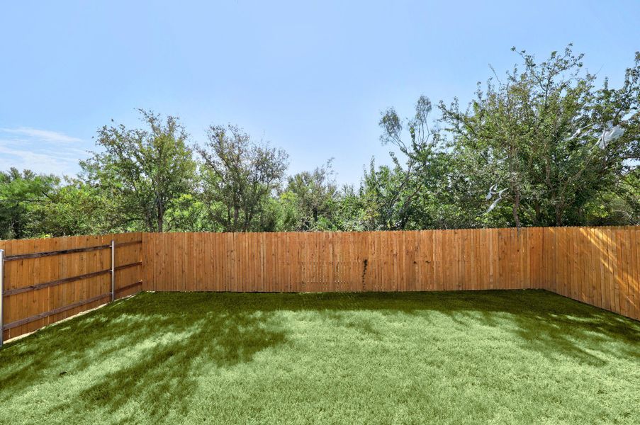 Exterior details and patio area of a home in Trinity Ranch, Elgin (Image 21).