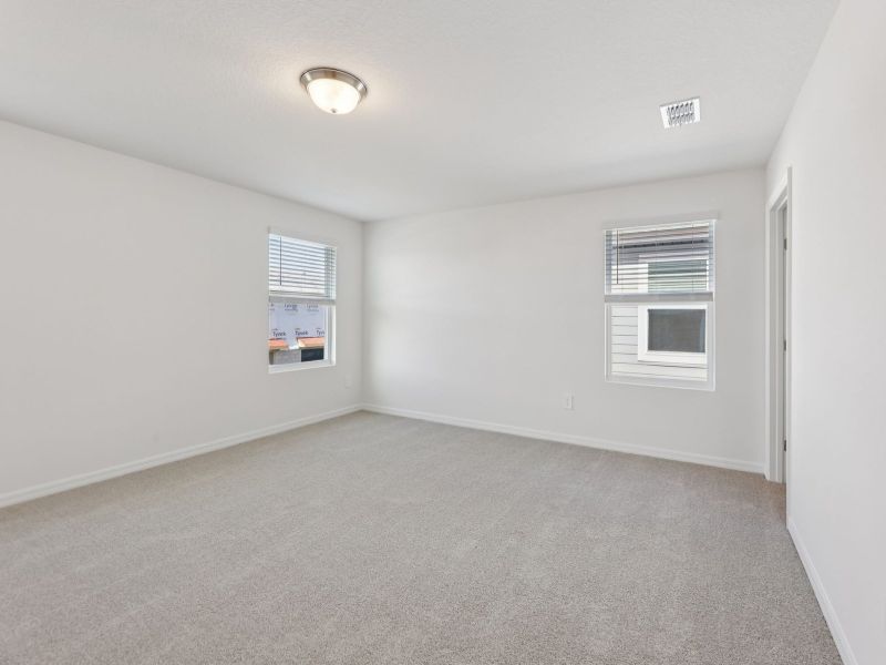 Spacious, unfurnished interior of a new home in The Meadow at Crossprairie Townes, St. Cloud (Image 11).