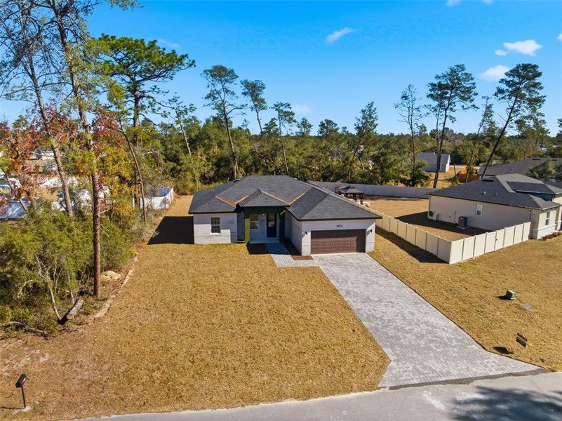 Front exterior of a new home in , Ocala, FL, highlighting curb appeal (Image 18).