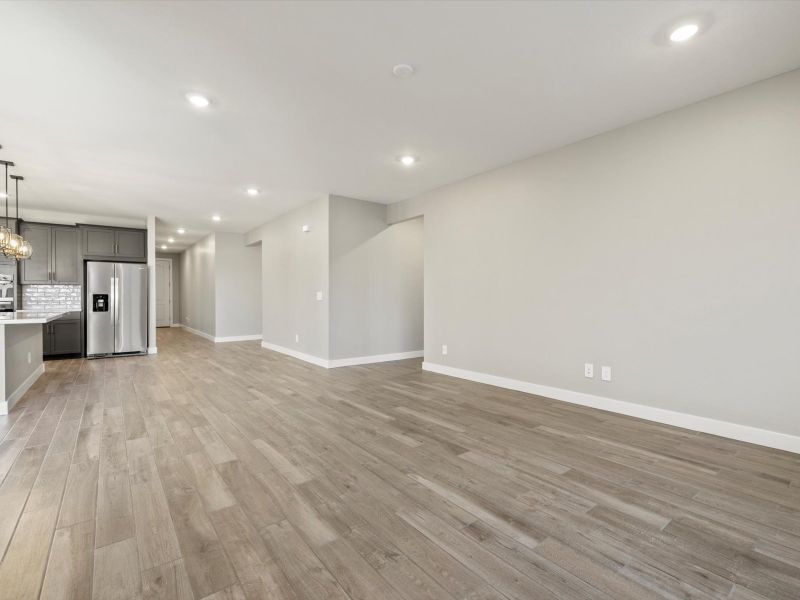 Spacious, unfurnished interior of a new home in Blossom Rock Reserve Series, Apache Junction (Image 7).