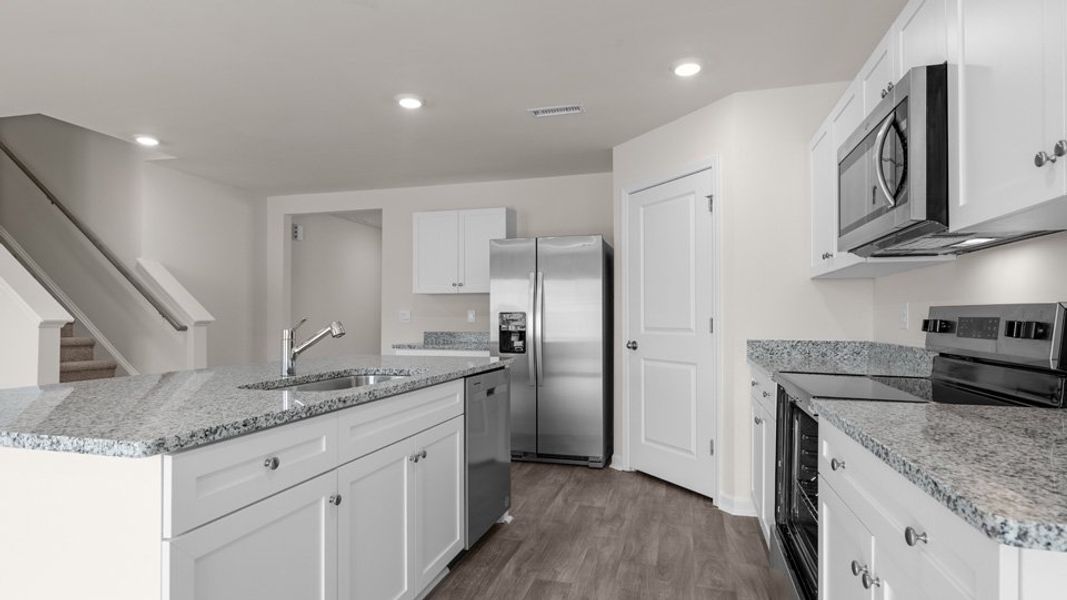 Representative furnished interior of a home built from the HAYDEN by D.R. Horton in Wilson's Ridge, Wilson's Mills (Image 9).
