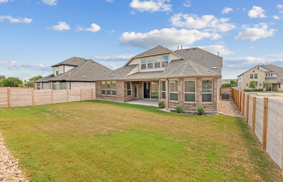 Exterior details and patio area of a home in Bluffview Reserve, Leander (Image 4).