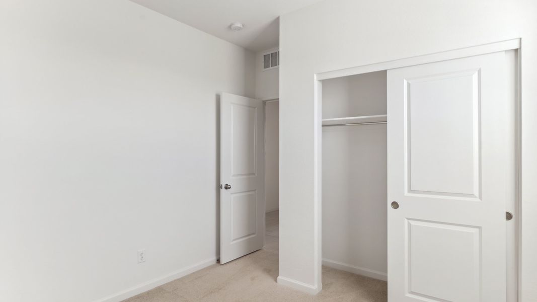 Spacious, unfurnished interior of a new home in Copper Falls, Buckeye (Image 11).