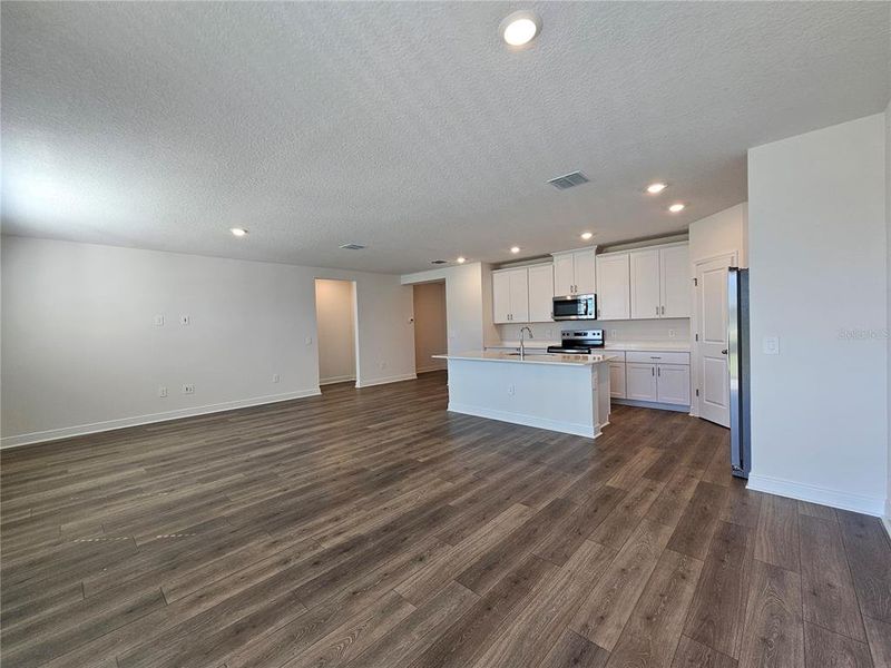 Spacious, unfurnished interior of a new home in The Reserve at Hammock Oaks - Signature Series, Lady Lake (Image 27).