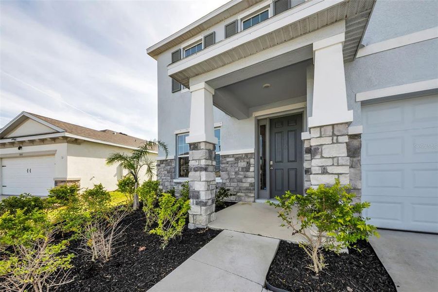 Exterior details and patio area of a home in Mangrove Manor, Apollo Beach (Image 23). Exterior details and patio area of a home in Mangrove Manor, Apollo Beach (Image 23).