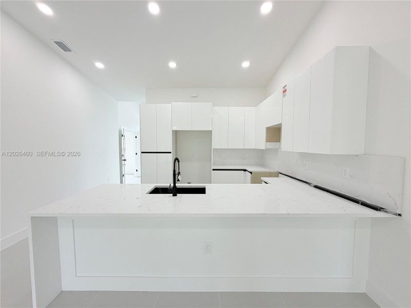 Furnished interior view inside a new home in , Lehigh Acres (Image 8).