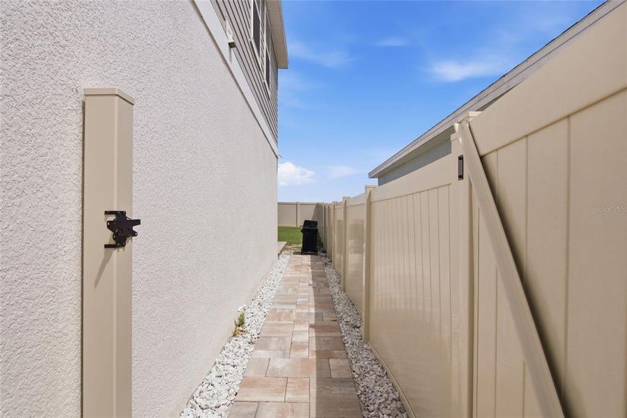 Exterior details and patio area of a home in Wellness Ridge, Clermont (Image 4).