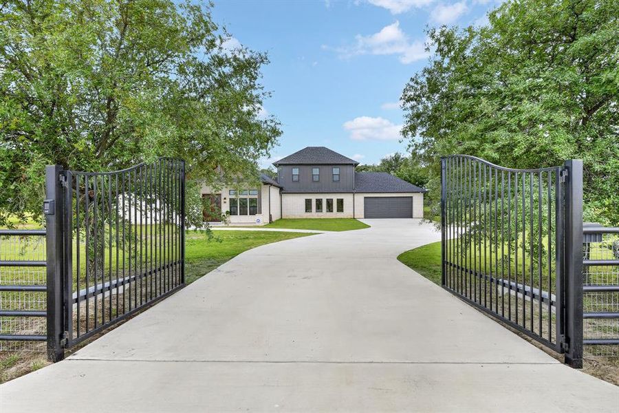 Gorgeous newly constructed home with secured gate welcomes you!