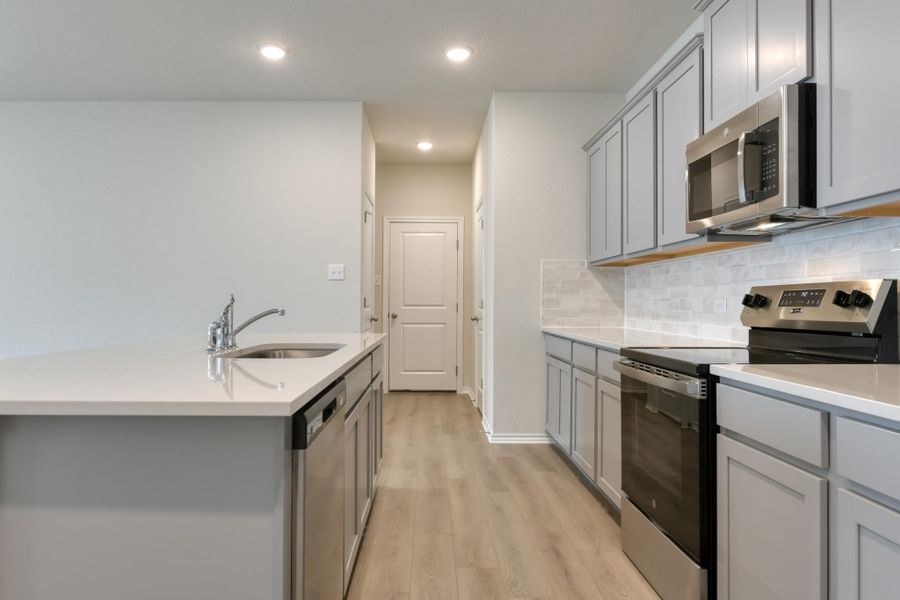 Representative furnished interior of a home built from the McKinney by Ashton Woods in Meadows at Hennersby Hollow 40's, San Antonio (Image 6).