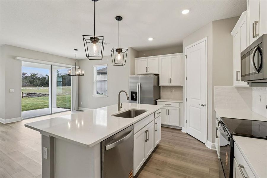 Furnished interior view inside a new home in Legends Preserve - Signature Series, Daytona Beach (Image 8).