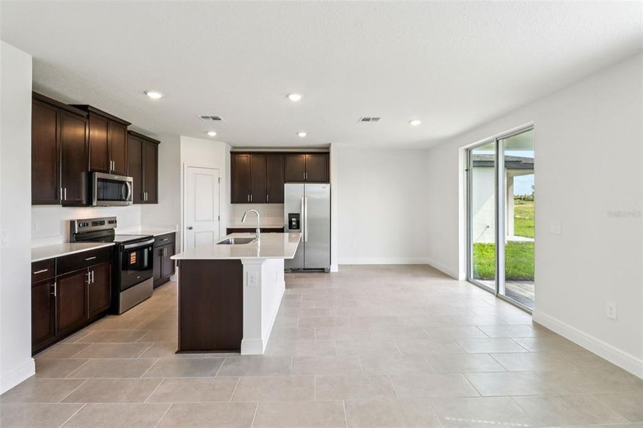 Furnished interior view inside a new home in The Reserve at Hammock Oaks - Classic Series, Lady Lake (Image 9).