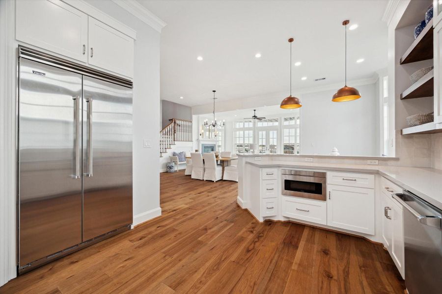 Beautiful kitchen with custom cabinetry. Plenty of storage with designer finishes.
