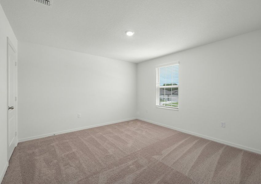 Each bedroom features lush carpet flooring