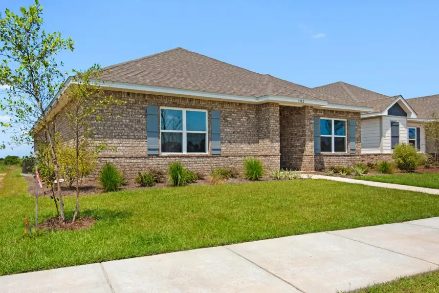 Front exterior of a new home in Yellow River Ranch, Milton, FL, highlighting curb appeal (Image 2). Front exterior of a new home in Yellow River Ranch, Milton, FL, highlighting curb appeal (Image 2).