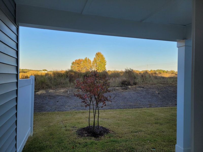 Exterior details and patio area of a home in 1158 Place Townhomes, Wilson (Image 2).