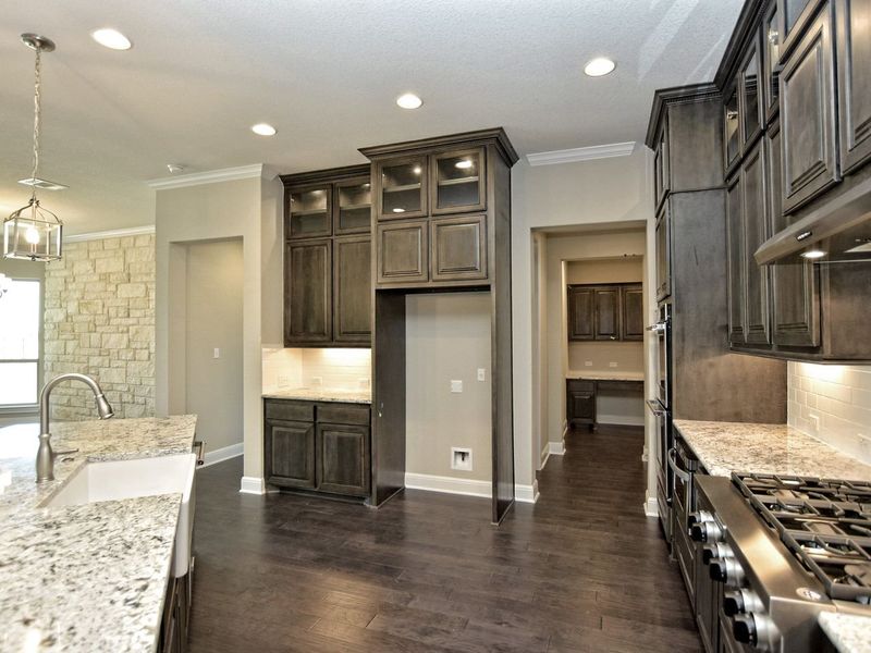 Representative furnished interior of a home built from the Madera II by Giddens Homes in Scofield Farms Estates, Georgetown (Image 200).