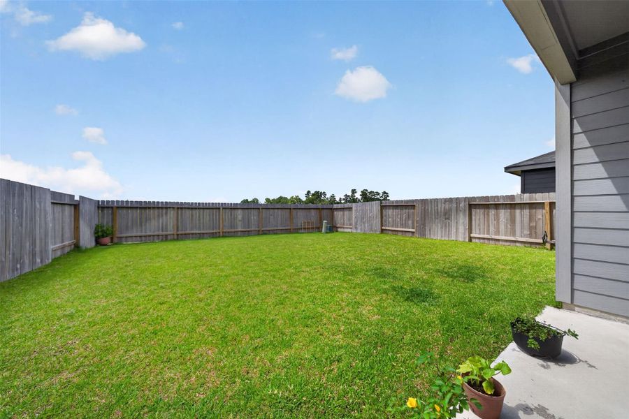 Exterior details and patio area of a home in , Houston (Image 3).