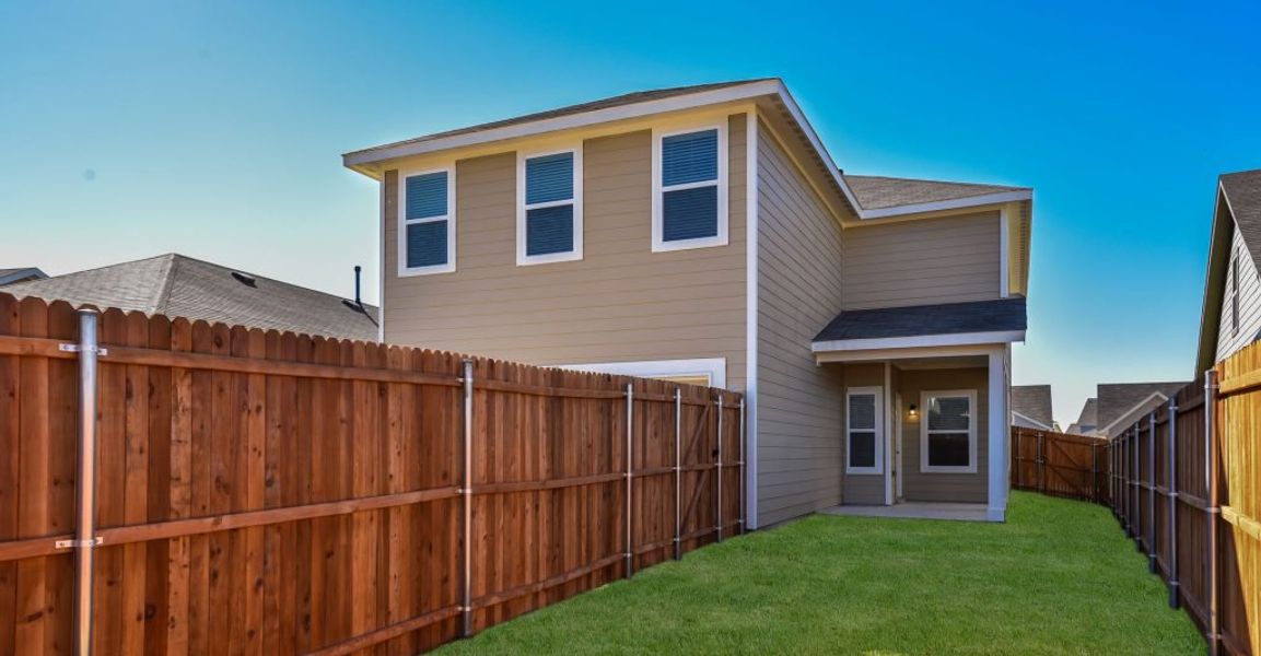 Representative exterior photo of a completed home built from the Adina by Impression Homes in Heartland, Heartland, TX (Image 24). Representative exterior photo of a completed home built from the Adina by Impression Homes in Heartland, Heartland, TX (Image 24).