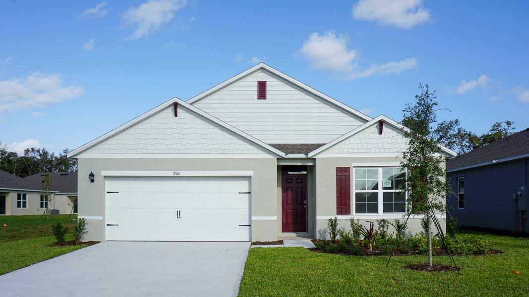 Representative exterior photo of a completed home built from the Cali by D.R. Horton in Tides Edge, Ormond Beach, FL (Image 2).