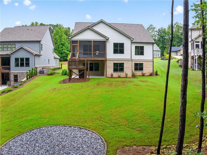 Front exterior of a new home in , Jefferson, GA, highlighting curb appeal (Image 28).