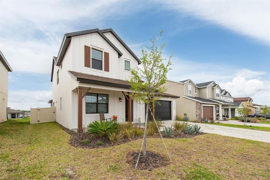 Front exterior of a new home in Hilltop Point, Dade City, FL, highlighting curb appeal (Image 23).