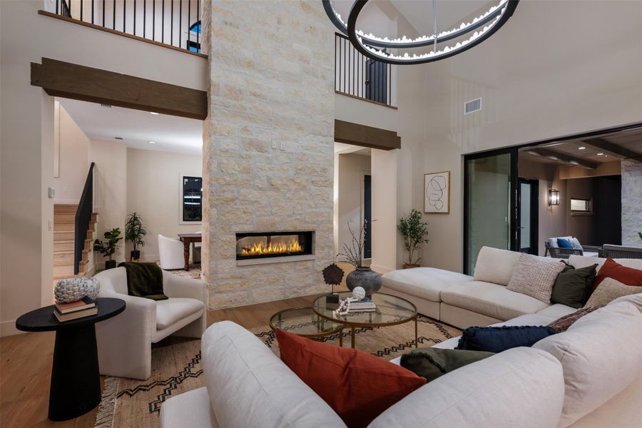 View from family room to second floor loft area & additional large bedroom with ensuite bath.