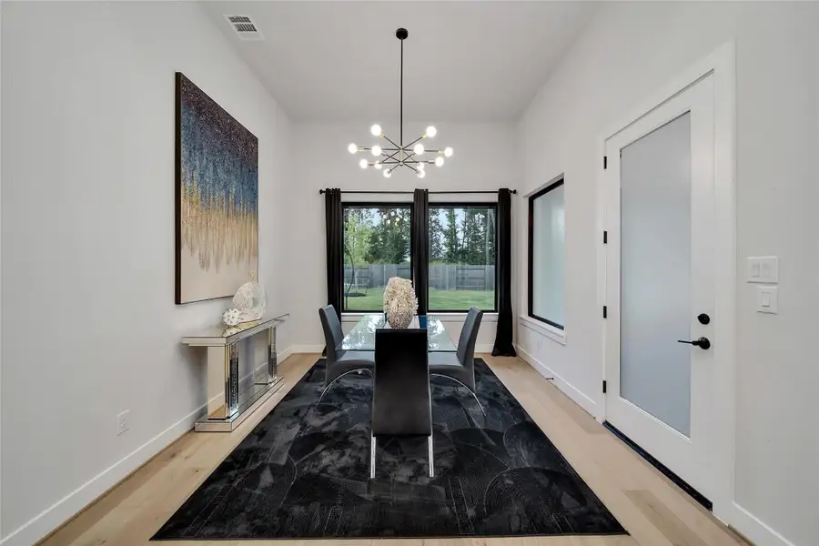 Furnished interior view inside a new home in ARTAVIA, Conroe (Image 40).