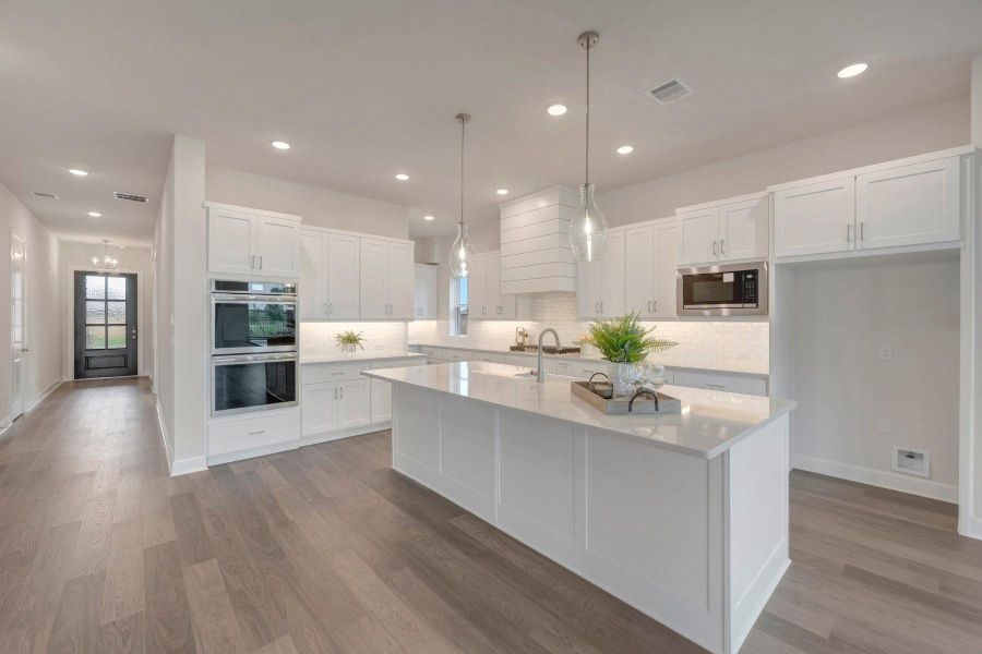 Furnished interior view inside a new home in Jordan Ranch - Premier Collection, Fulshear (Image 7).