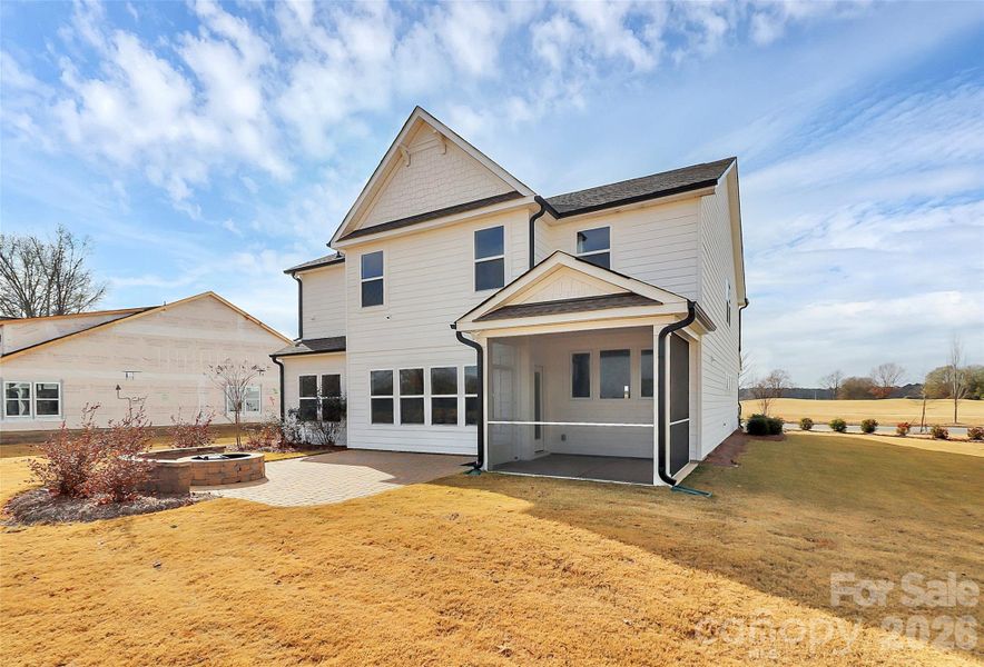 Exterior details and patio area of a home in Stonebridge Fairways, Monroe (Image 4).