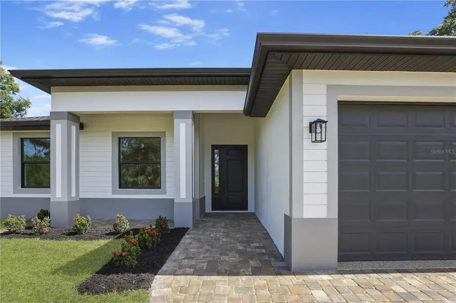 Exterior details and patio area of a home in , Port Charlotte (Image 3). Exterior details and patio area of a home in , Port Charlotte (Image 3).