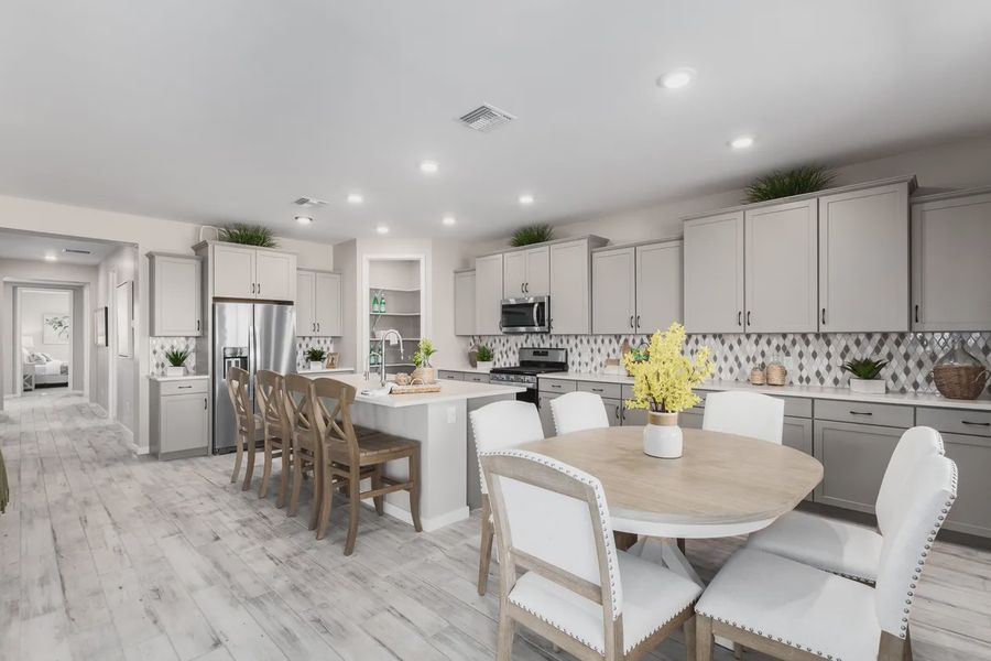 Representative furnished interior of a home built from the 2326 by Elliott Homes in Acacia at Santana, Yuma (Image 11).