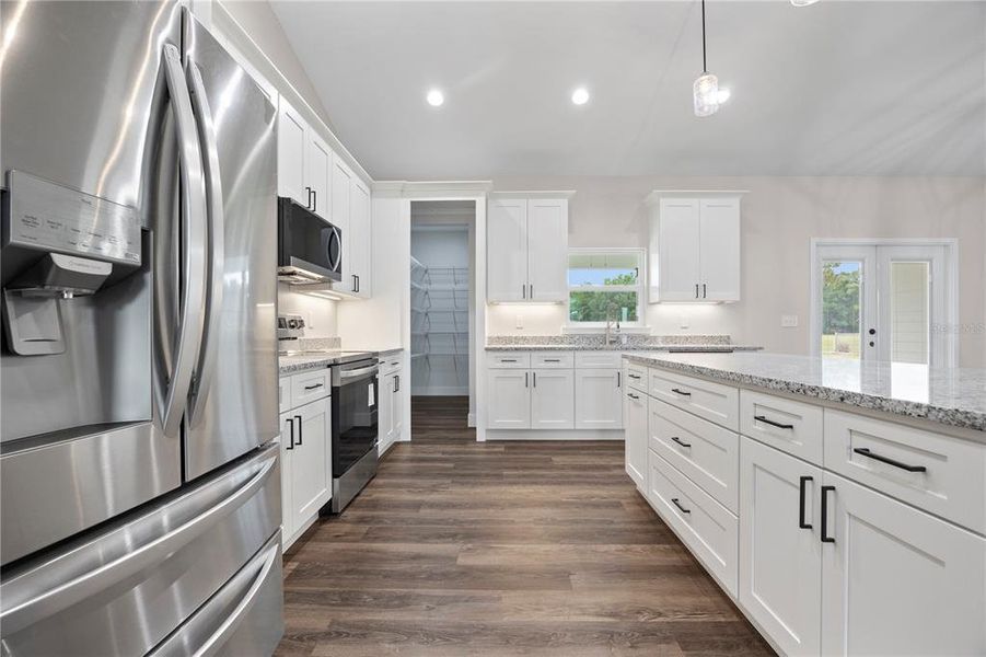 Furnished interior view inside a new home in , Lake City (Image 16).