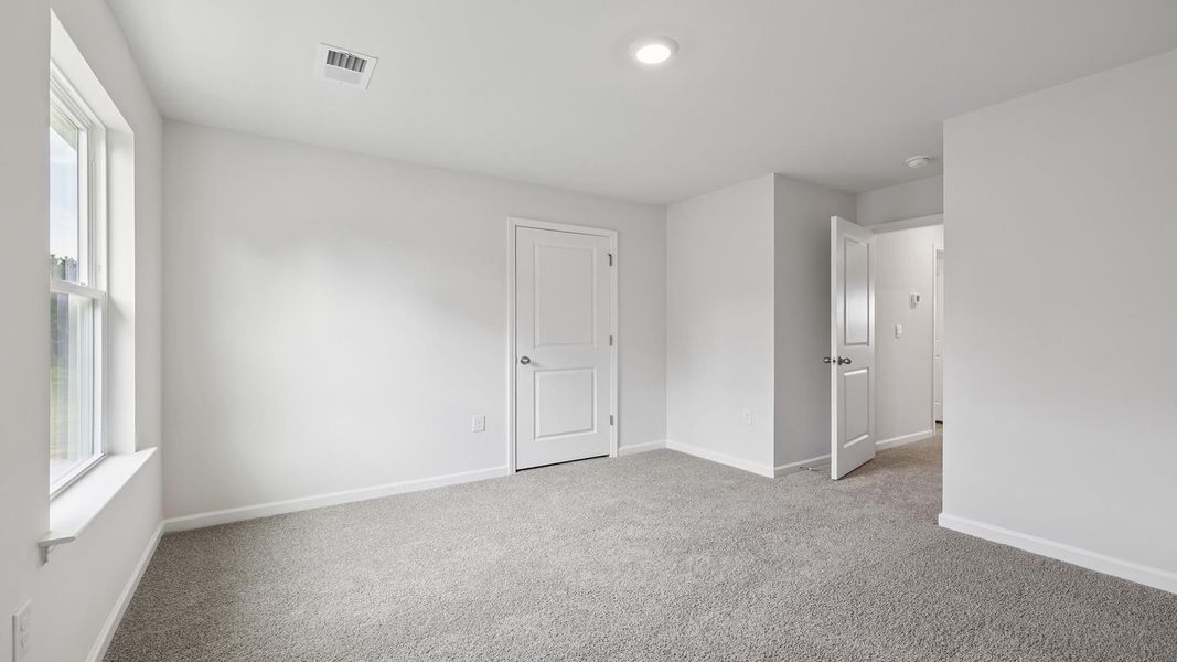 Spacious, unfurnished interior of a new home in Paddock Point, Roebuck (Image 23).