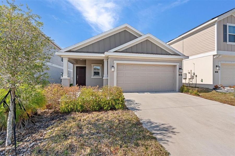 Front exterior of a new home in , Davenport, FL, highlighting curb appeal (Image 21). Front exterior of a new home in , Davenport, FL, highlighting curb appeal (Image 21).