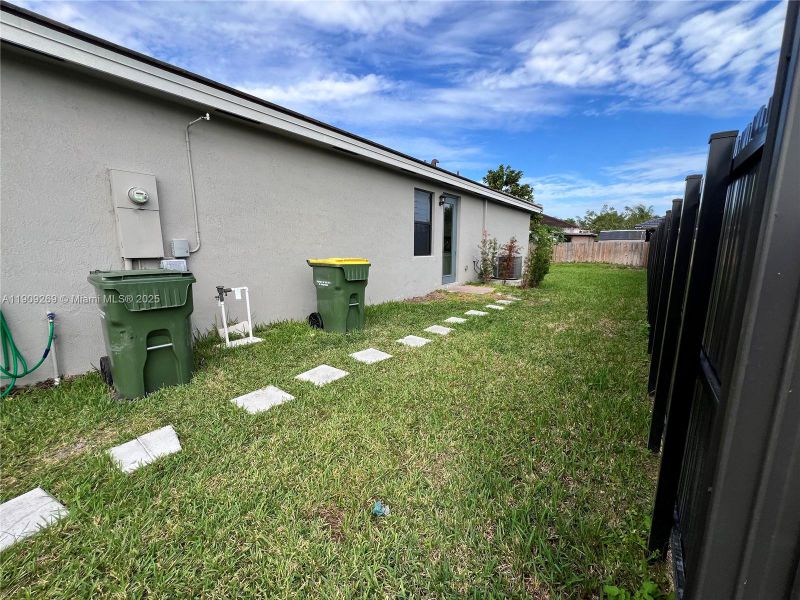 Exterior details and patio area of a home in , Homestead (Image 3). Exterior details and patio area of a home in , Homestead (Image 3).