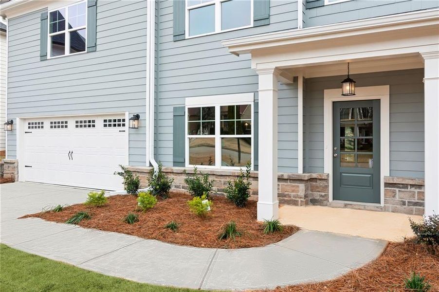 Exterior details and patio area of a home in Traditions of Braselton, Jefferson (Image 2).