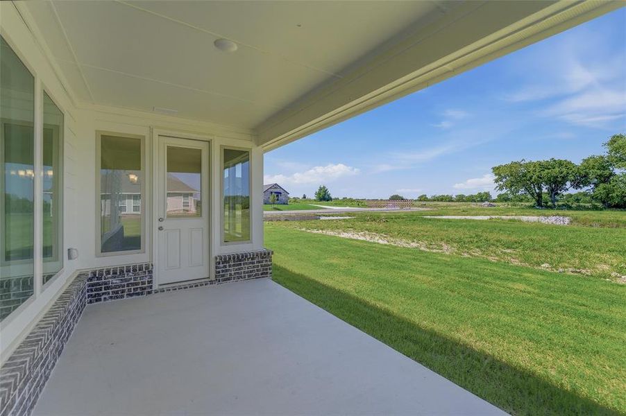 Covered patio with a concrete surface